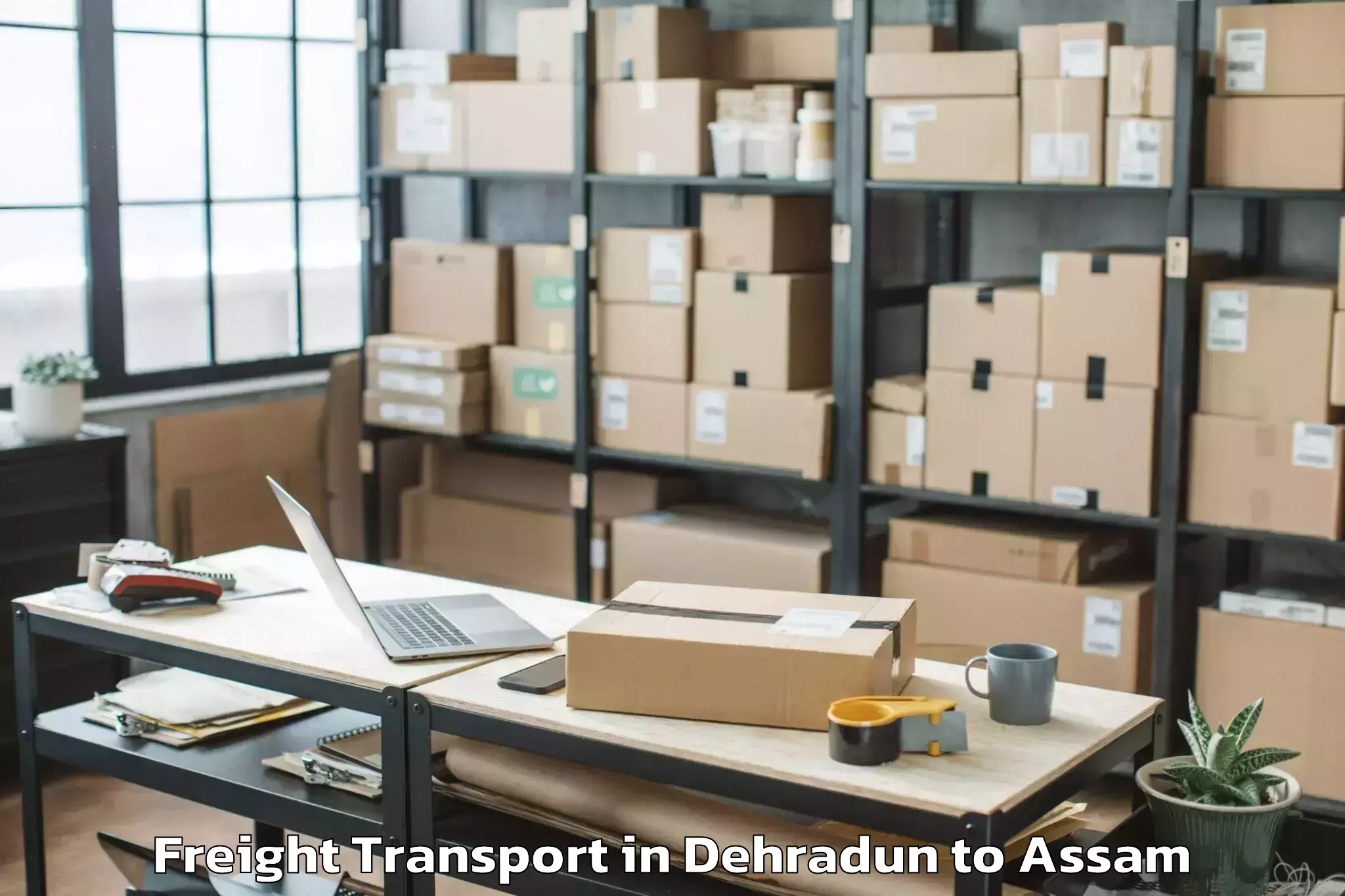 Professional Dehradun to Bijni Freight Transport